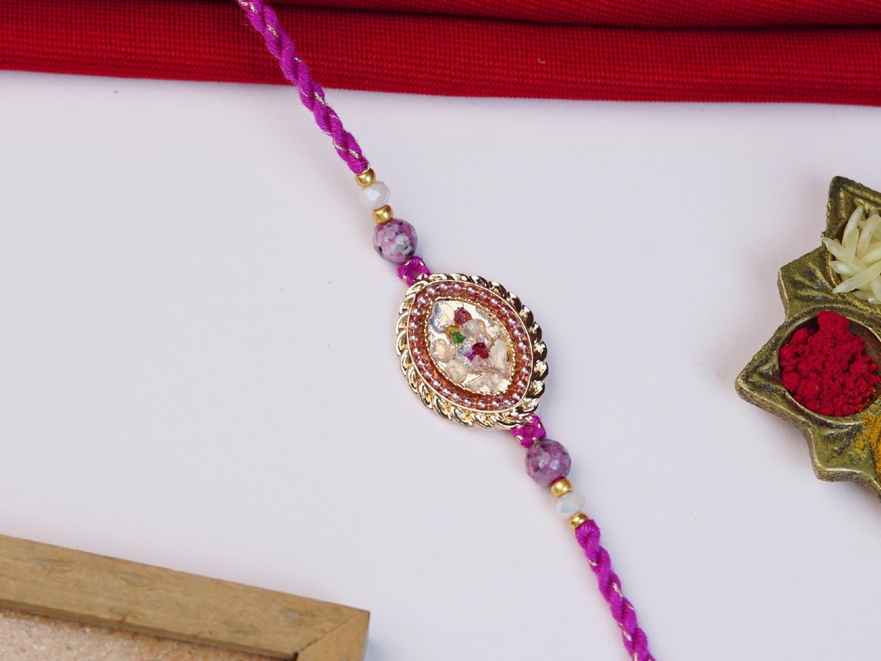 Golden Oval Rakhi