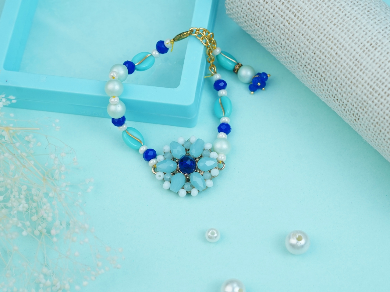 Elegant Blue Pearl Bracelet Rakhi