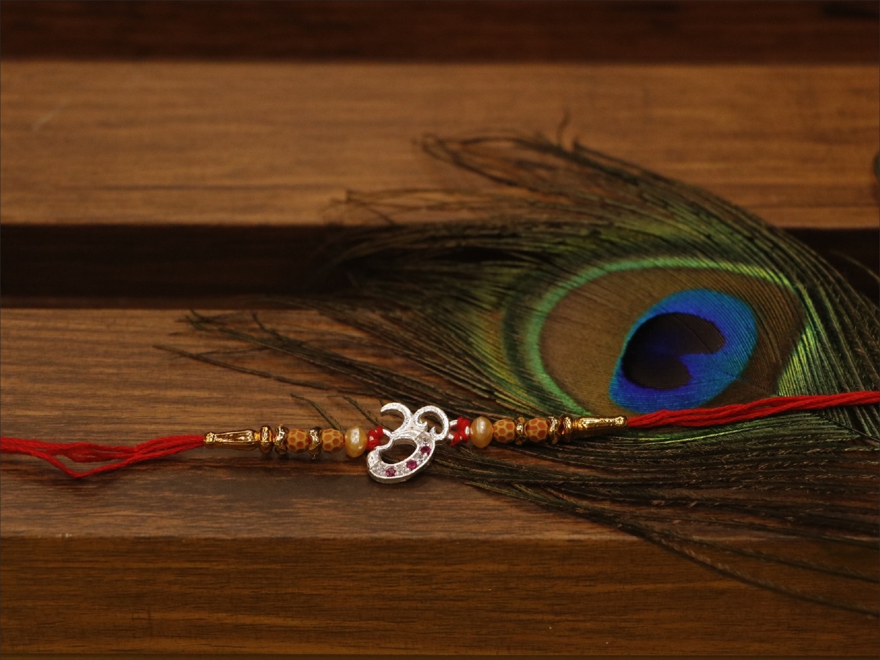 Silver Om Rakhi