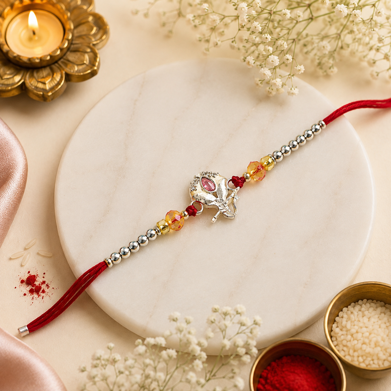 Ganesha Pearl Silver Rakhi (CB-S-39)